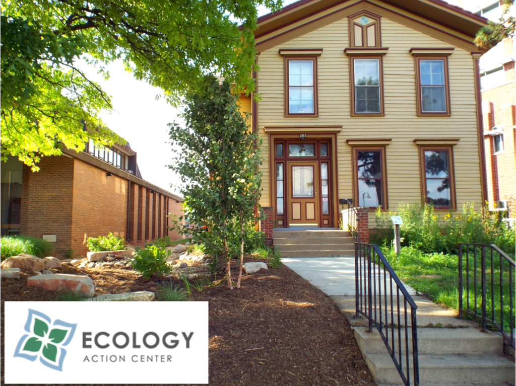 A yellow and brown historic home that the Ecology Action Center is located in